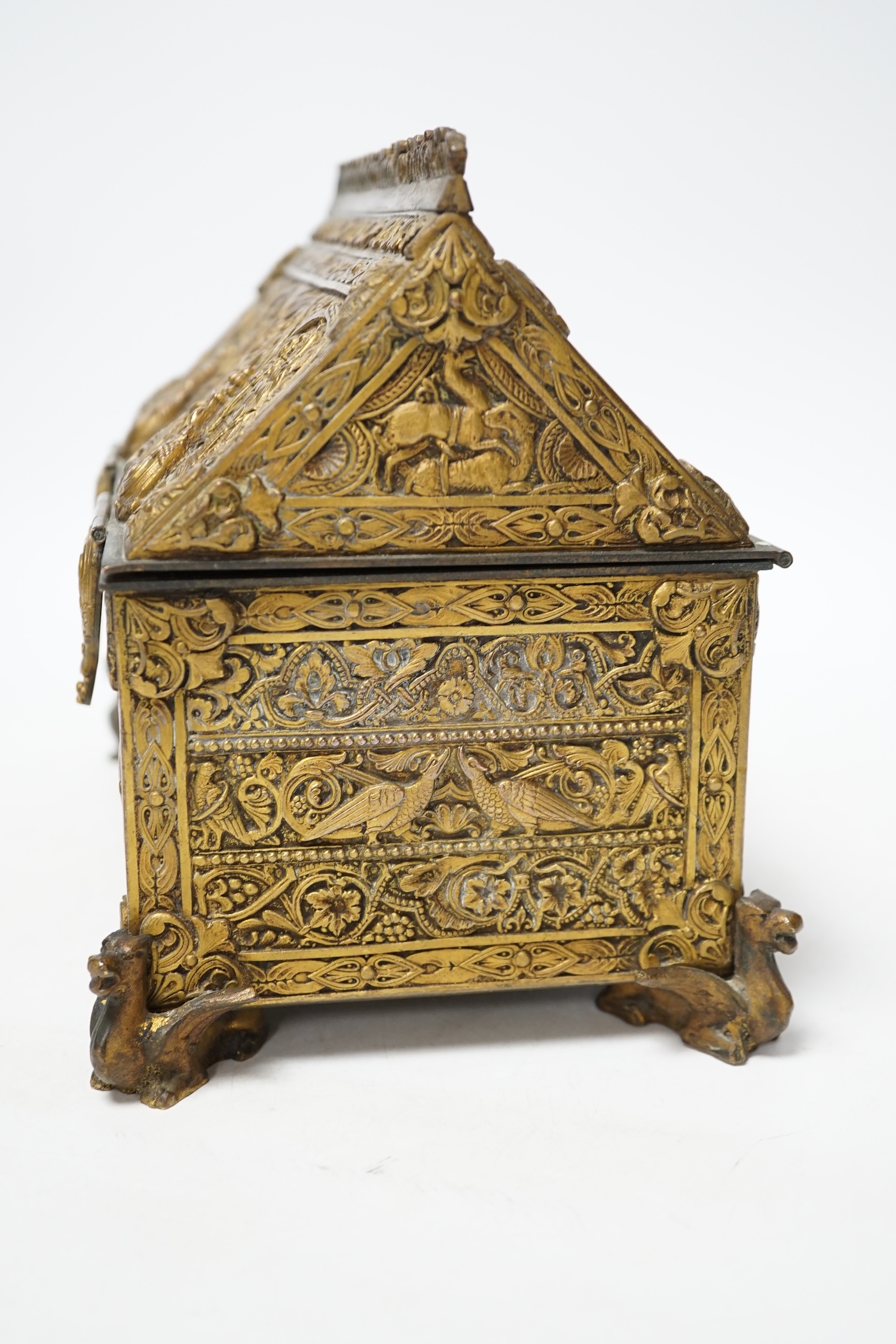 A late 19th century French Gothic revival embossed brass casket, 23cm